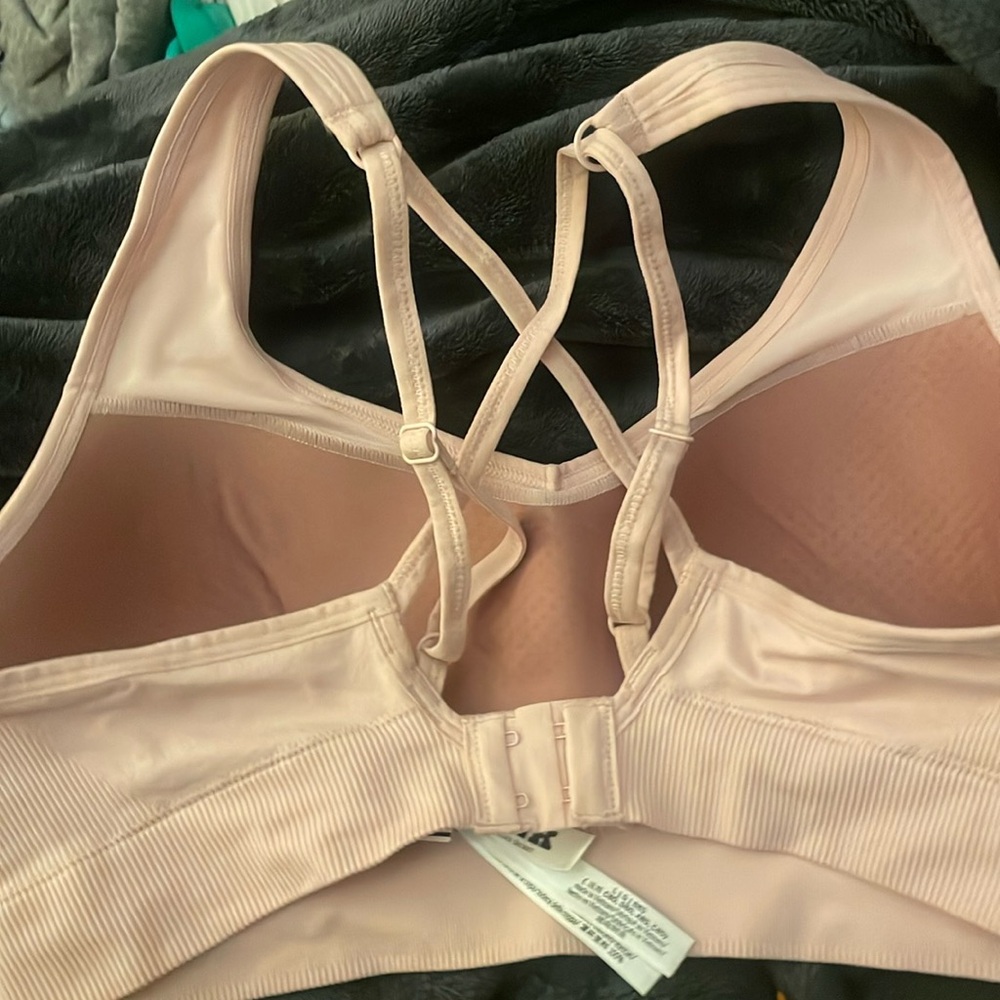 Pink Victoria secret sport bra .